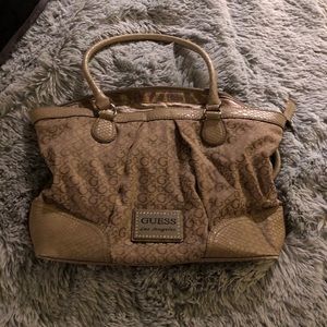 Guess medium sized purse.